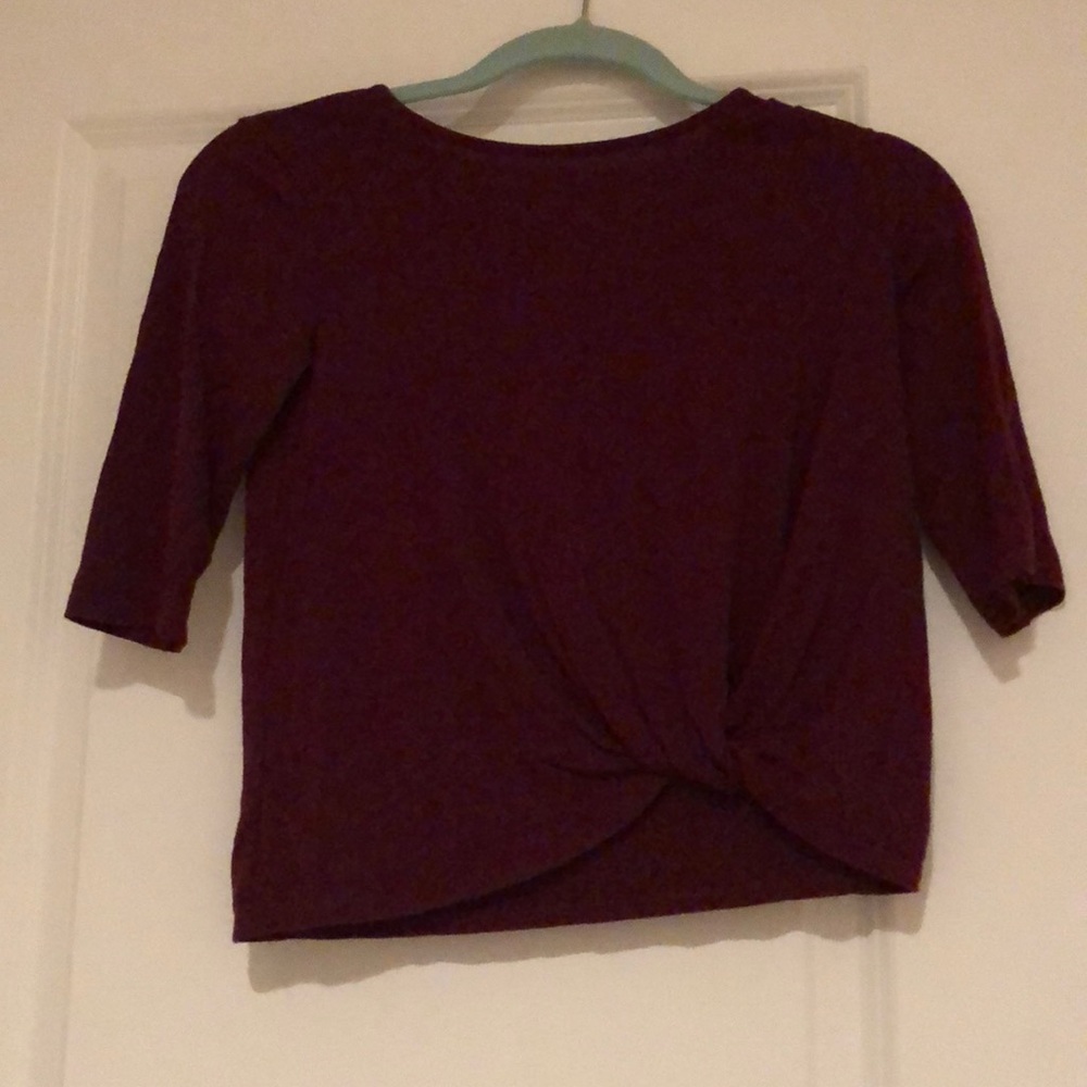 Maroon shirt with tie at the bottom